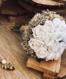 Dried baby breath and silk ivory rose